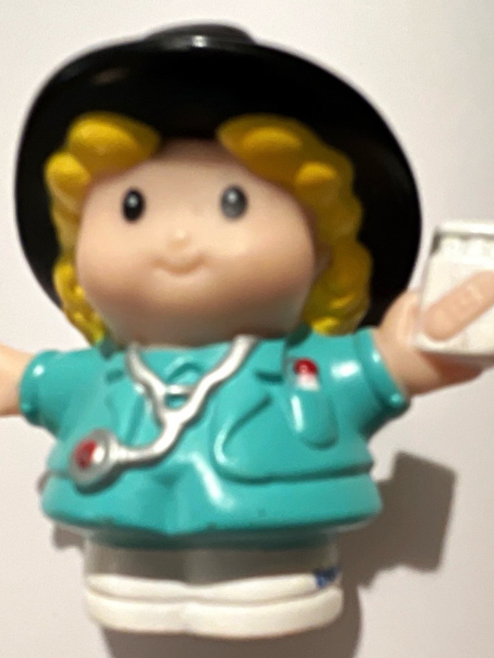 Mattel Teal Nurse Doll with Black Hat and Yellow Hair